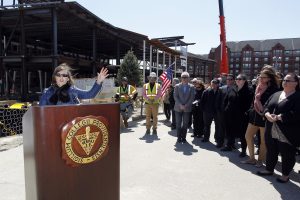 Dr. Sylvia Maxfield, Dean of the Providence College School of Business, speaks at the Ryan Center Topping Off Ceremony.