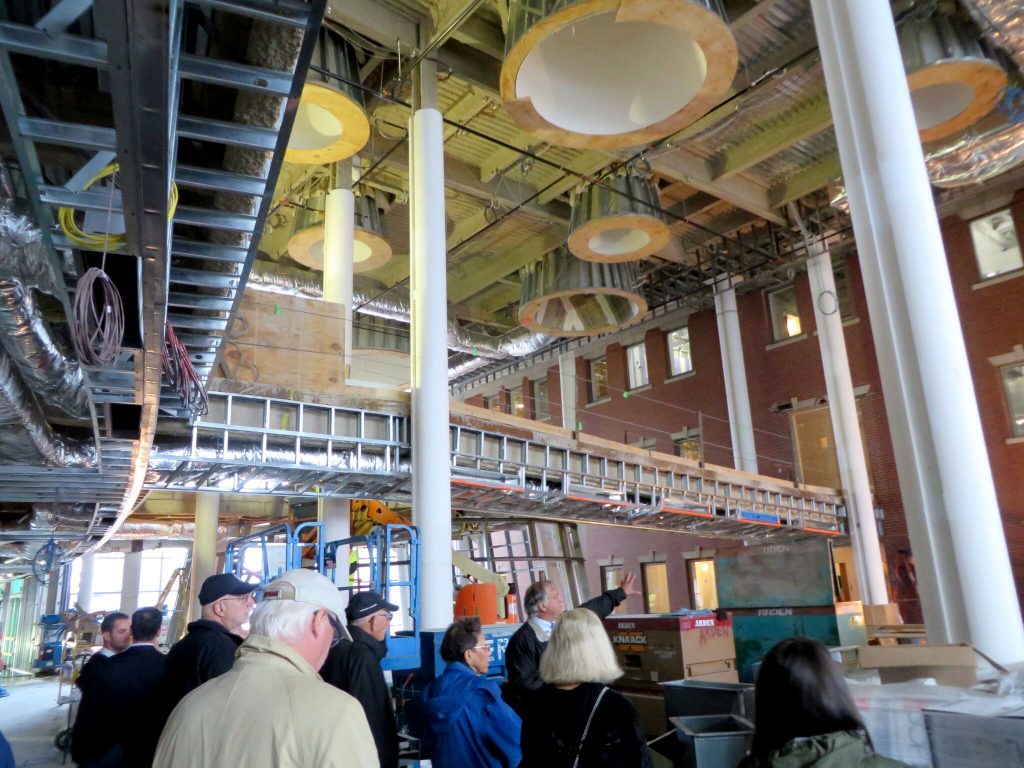 Providence College alumni take a tour of the new Ryan Center for Business Studies during St. Dominic Weekend 2016.