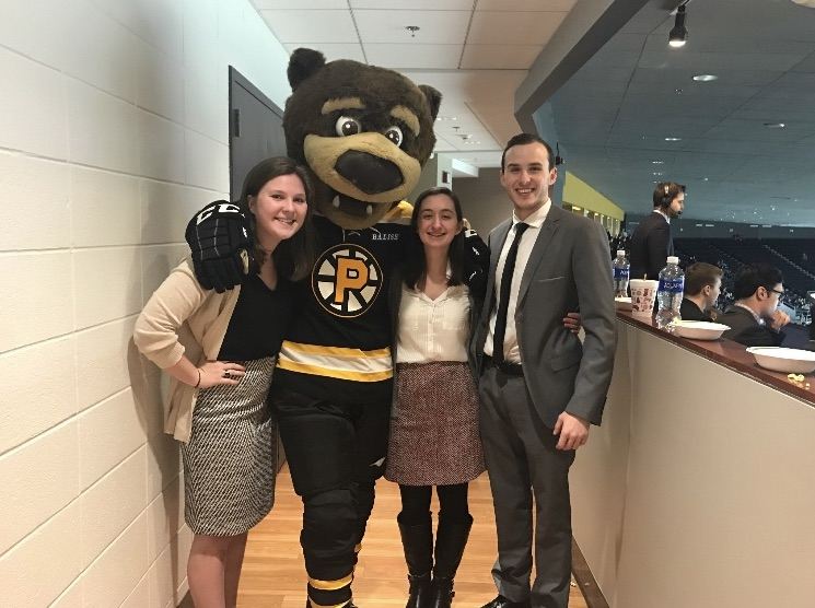 Katie Sullivan '18 with two other interns at her internship with the Providence Bruins.
