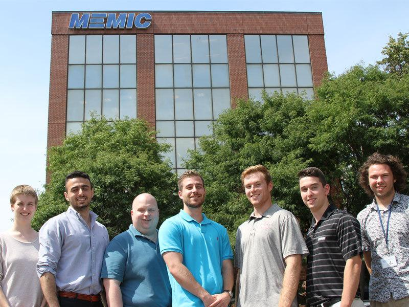 A group of interns outside MEMIC, Kerry Crepeau is second from the right.
