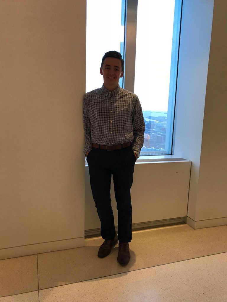 Tristan Janowicz '16 poses in front of a window.