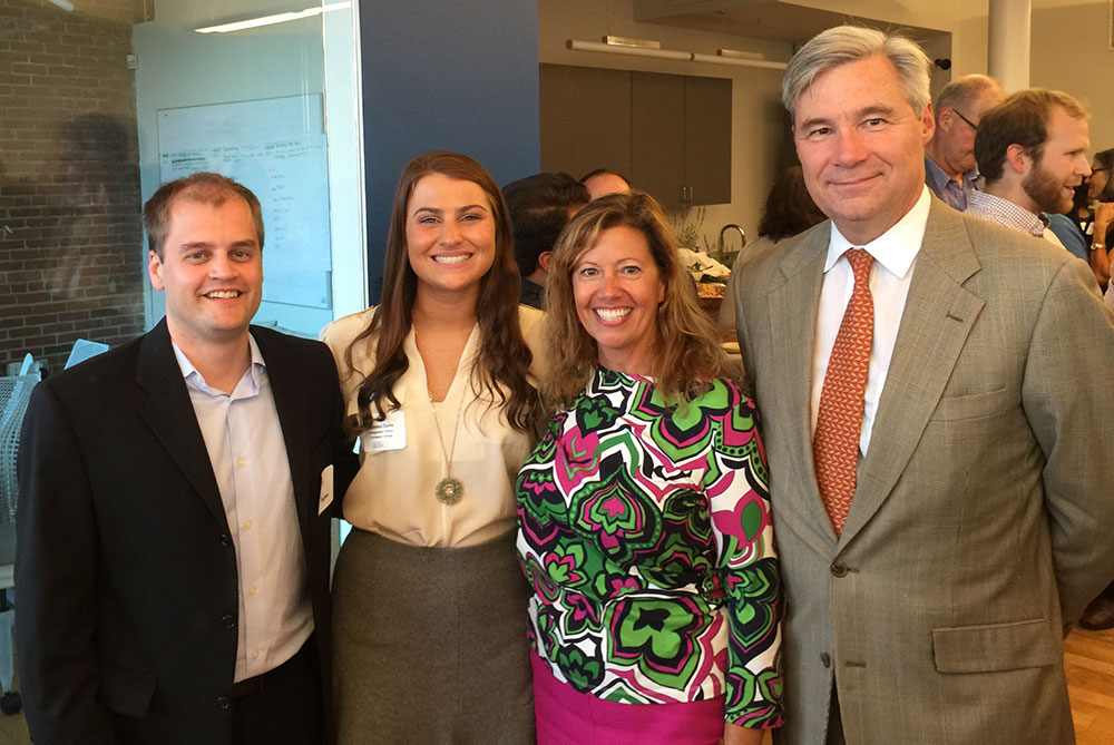 Madeline Curto (second from left), a junior marketing major, was honored for her Changemaker Fellowship appointment at a celebration co-hosted by Sen. Sheldon Whitehouse (right) on Monday, Sept. 14. Marketing faculty members Kevin Newman (left) and Rae Caloura (second from right) attended the celebration to support Madeline.