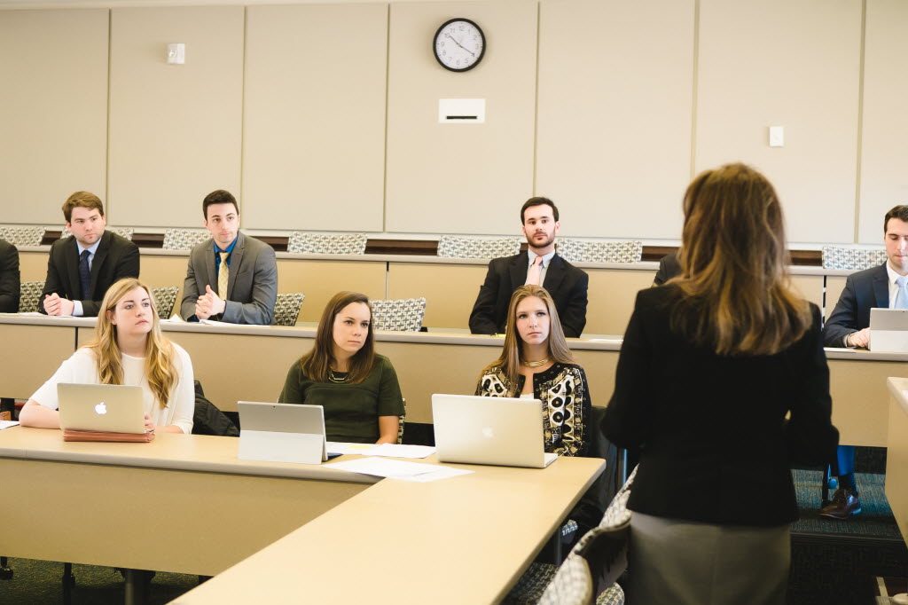 MBA students attend an on-campus lecture following their global excursion to Paris, France.