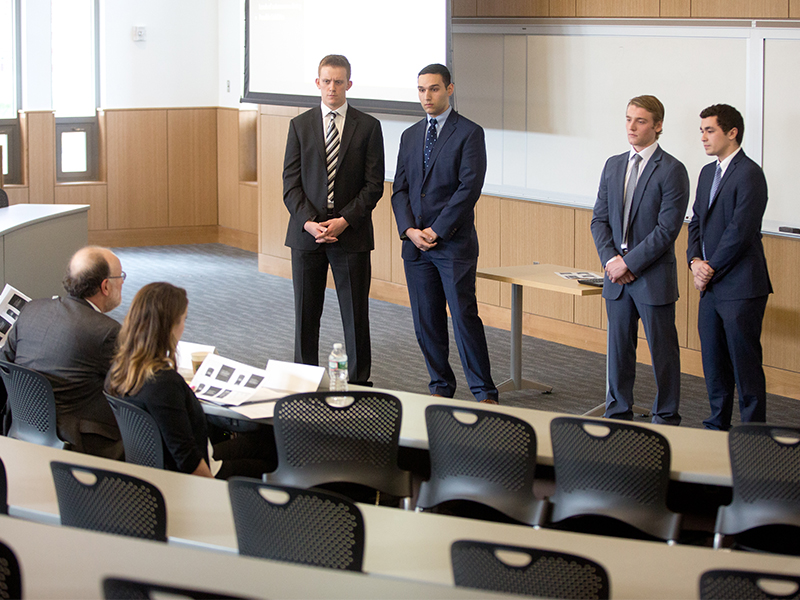 Michael Smith Ethics Case Competition team responds to questions during their presentation.