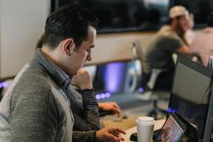 Man looking at computer screen