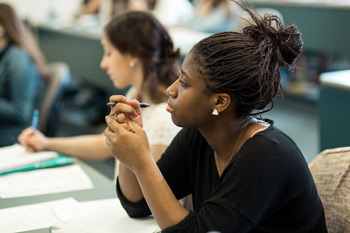 A student engages in class discussion.