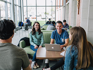 Students working together in the Ryan Center.