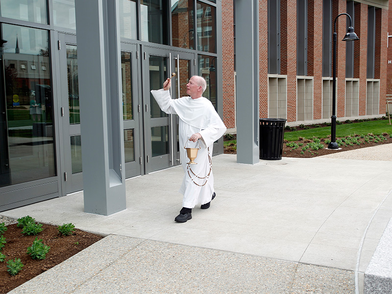 Father Shanley blessing the Ryan Center.