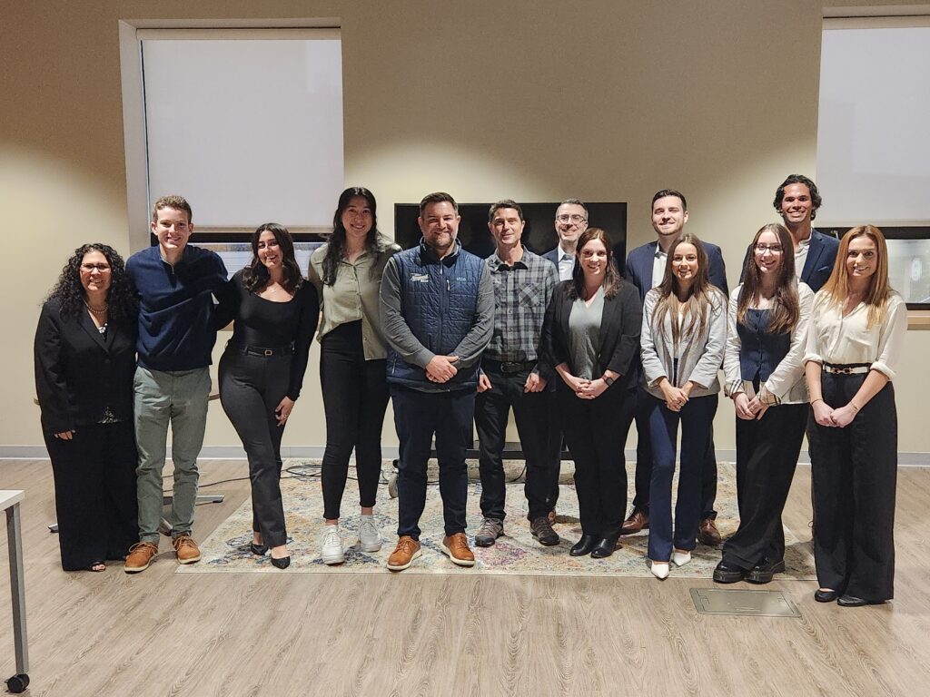 Group of PCSB MBA students with Patrick Maguire and Jim Crooks in the middle