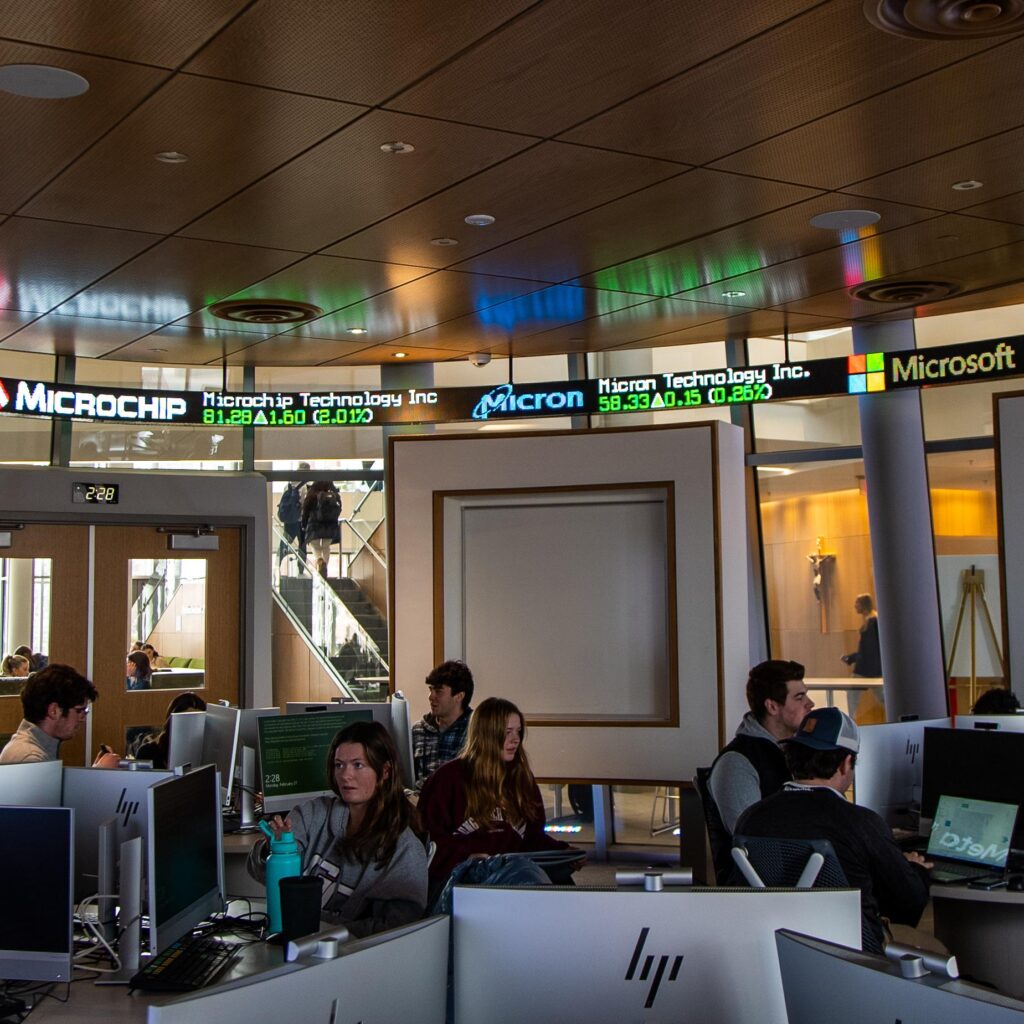 Students sit at computer terminals in the Scanlon Financial Information Resources Lab.