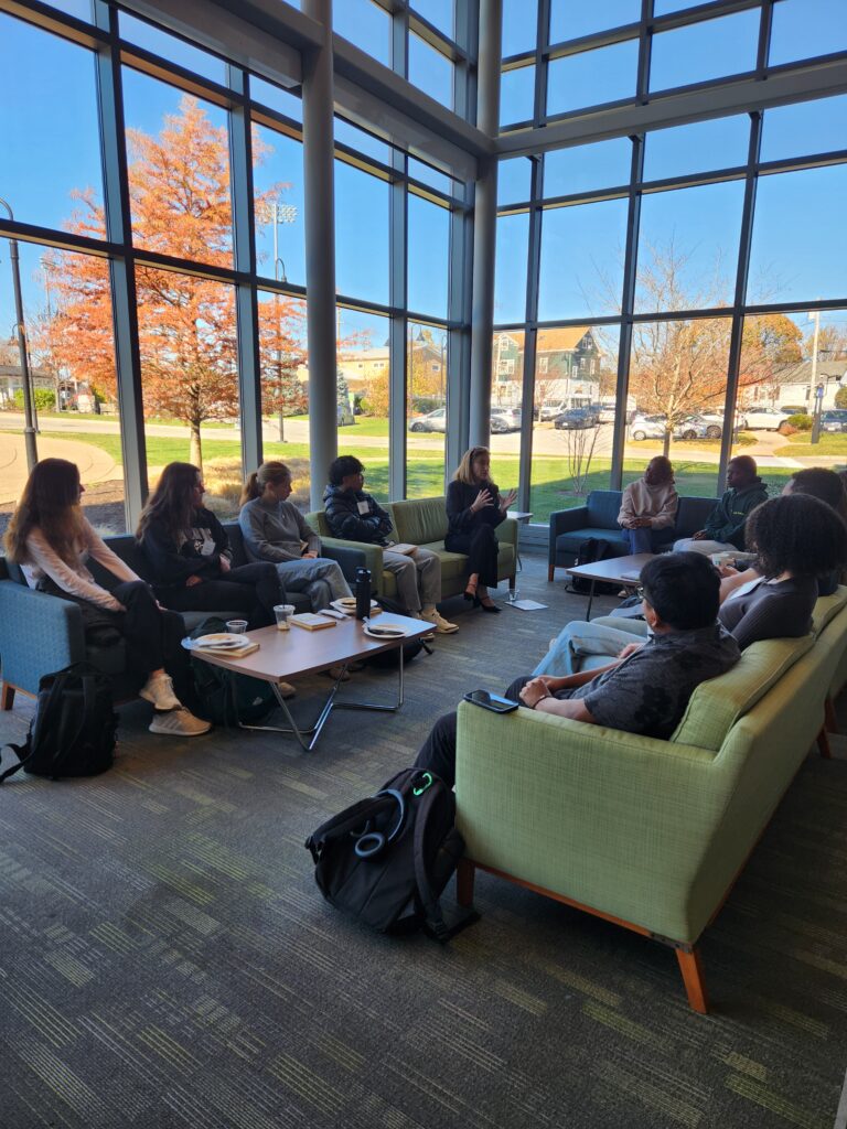 Dr. Hebl with student leaders in Dietz Norko Lounge