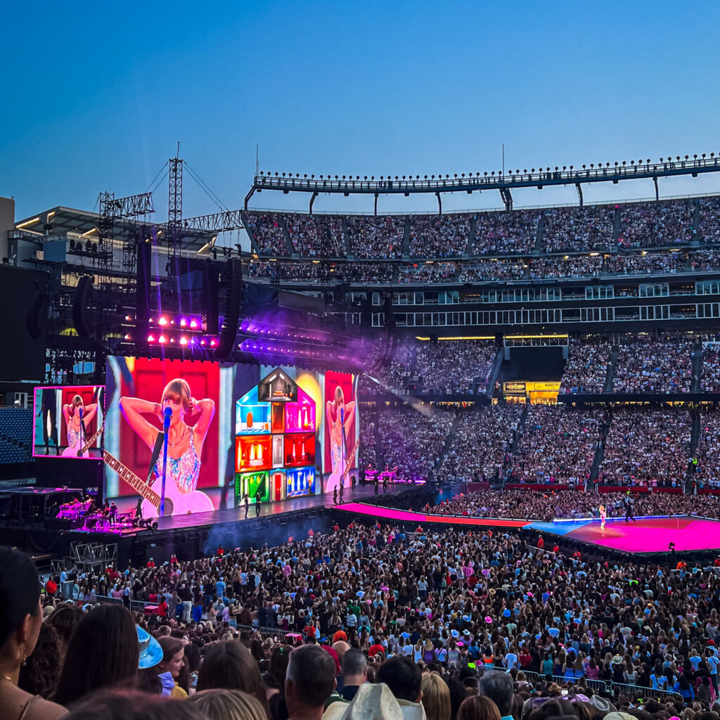 Taylor Swift performing at Gillette Stadium during the Eras Tour, May 2023, photographed by Providence College student Mackenzie Taylor ’27.