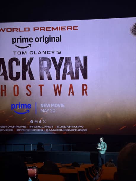 A picture taken from the audience of John Krasinski at his movie premiere.